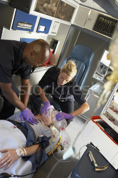 Paramedics performing CPR on patient in ambulance Stock photo © monkey_business