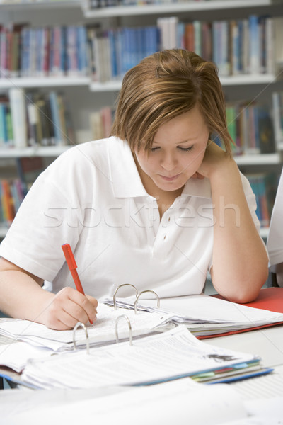 étudiant étudier bibliothèque fille éducation écrit [[stock_photo]] © monkey_business