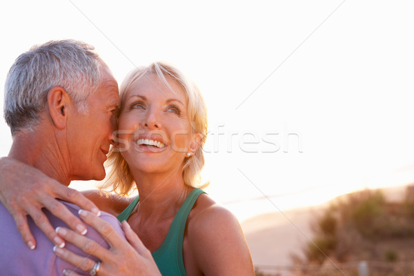 Stock photo: Romantic Senior Couple in love at sunset