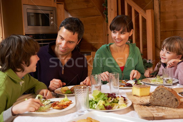 Family Enjoying Meal In Alpine Chalet Together Stock photo © monkey_business