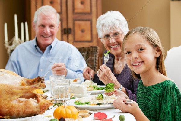 Granddaughter Celebrating Thanksgiving With Grandparents Stock photo © monkey_business