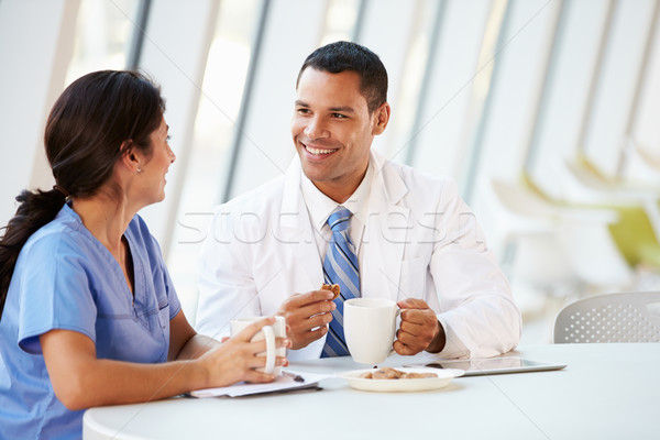 Orvos nővér beszélget modern kórház étkezde Stock fotó © monkey_business
