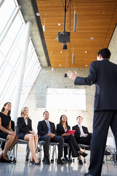 Stock photo: Delegates Listening To Speaker At Conference