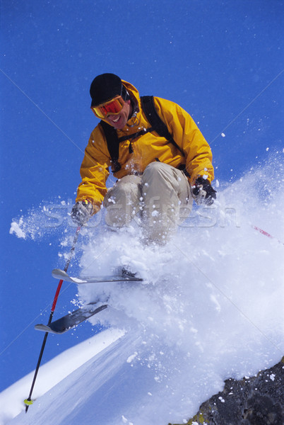 Сток-фото: молодым · человеком · лыжах · снега · горные · Blue · Sky · праздник