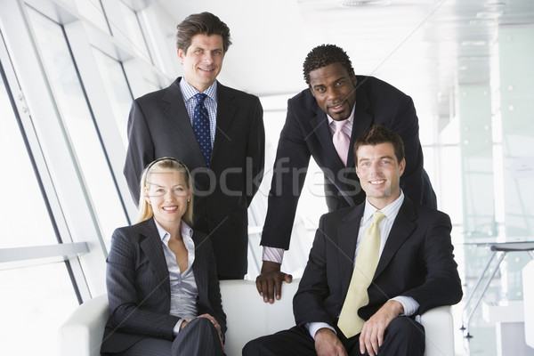 Quatre gens d'affaires bureau lobby souriant affaires Photo stock © monkey_business