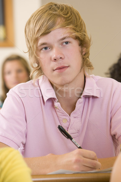 Male college student listening to a university lecture Stock photo © monkey_business