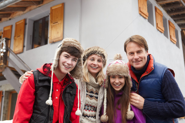 Portrait Of Family Standing Outside Chalet On Ski Holiday Stock photo © monkey_business