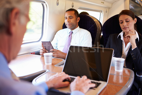 Сток-фото: бизнесмен · работу · поезд · используя · ноутбук · человека