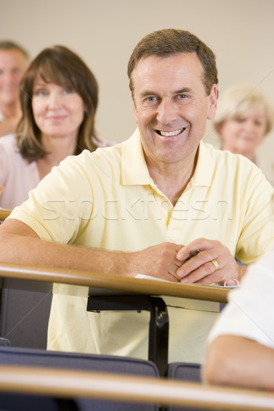 Masculina adulto estudiante escuchar Universidad conferencia Foto stock © monkey_business