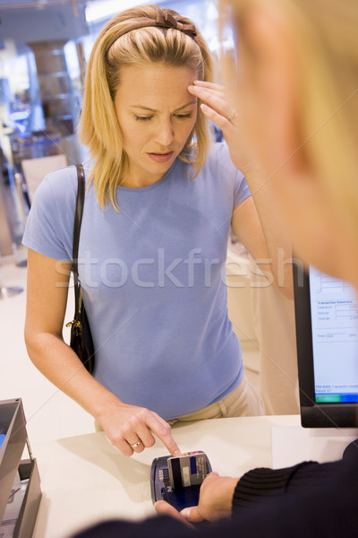 Customer in store remembering PIN number Stock photo © monkey_business