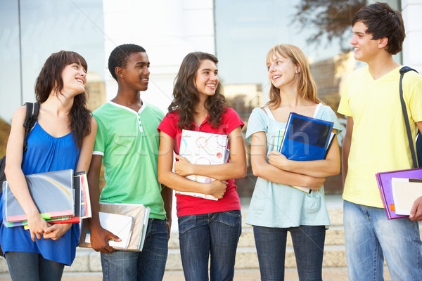 Grupo adolescente estudantes em pé fora faculdade Foto stock © monkey_business