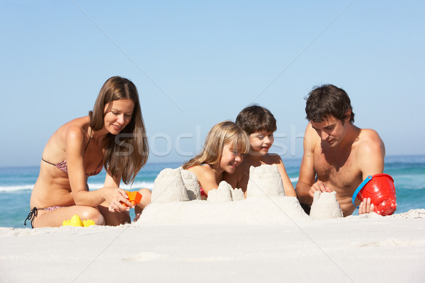 Familie Gebäude Strandurlaub glücklich Kind Meer Stock foto © monkey_business