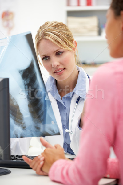 Young doctor with female patient Stock photo © monkey_business