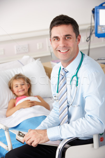 Doctor with child patient in UK Accident and Emergency Stock photo © monkey_business