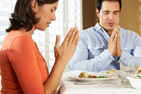 Couple Saying Grace Before Meal At Home Stock photo © monkey_business