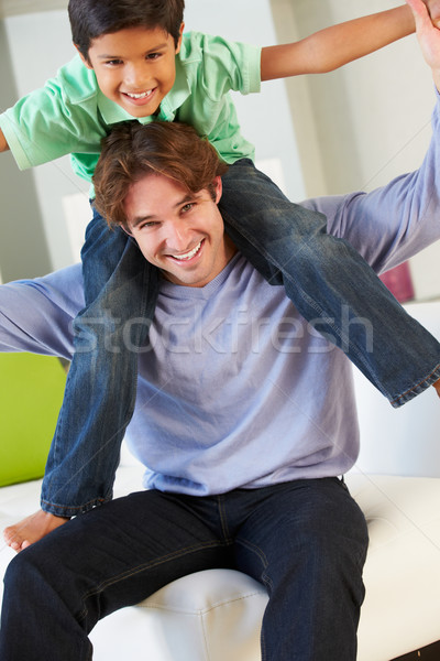 Father And Son Having Fun On Sofa Together Stock photo © monkey_business