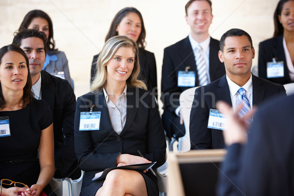 Ascolto speaker conferenza business donne uomini Foto d'archivio © monkey_business