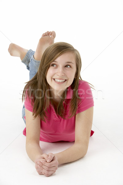 Stock photo: Teenage Girl Laying On Stomach