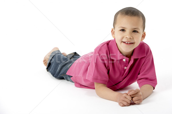 Young Boy Lying On Stomach In Studio Stock photo © monkey_business