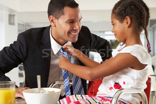 Daughter Straightens Father's Tie Before He Leaves For Work Stock photo © monkey_business
