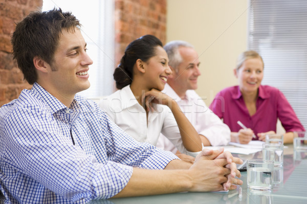 четыре Boardroom улыбаясь таблице деловые люди Сток-фото © monkey_business