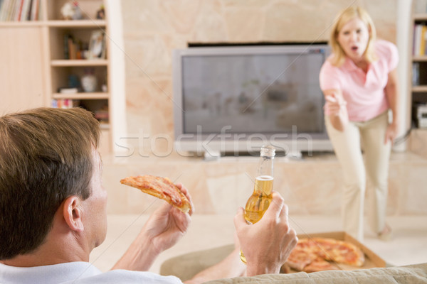 Wife Telling Husband Off For Drinking Beer And Eating Pizza Stock photo © monkey_business