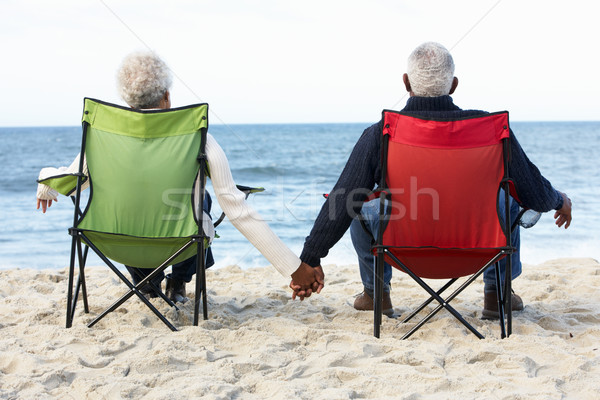 坐在 海灘 女子 婦女 男子 商業照片 © monkey_business