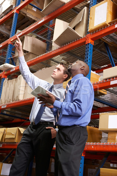 Two Businessmen With Digital Tablet In Warehouse Stock photo © monkey_business