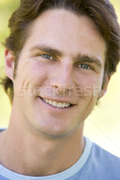 голову выстрел человека улыбаясь лице портрет Сток-фото © monkey_business