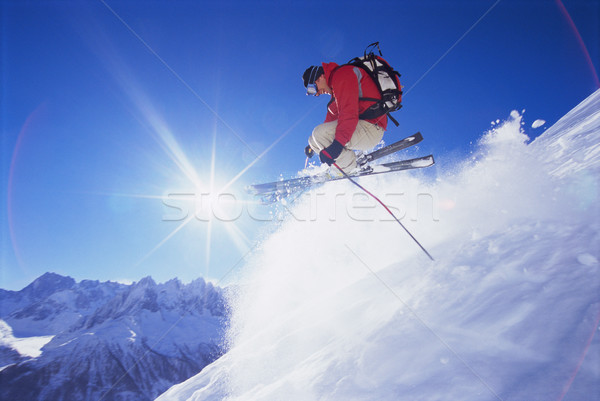 Stock foto: Junger · Mann · Skifahren · Schnee · blauer · Himmel · Urlaub · Urlaub