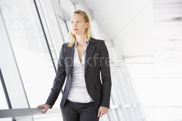 Businesswoman standing in corridor Stock photo © monkey_business