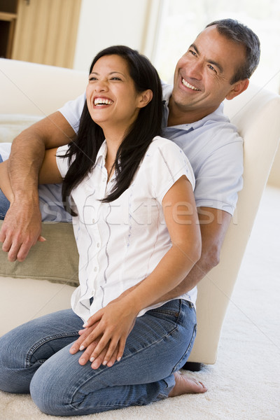 Para salon śmiechem człowiek szczęśliwy sofa Zdjęcia stock © monkey_business