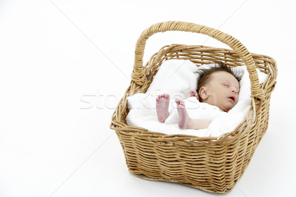 Newborn Baby Sleeping In Basket Stock photo © monkey_business