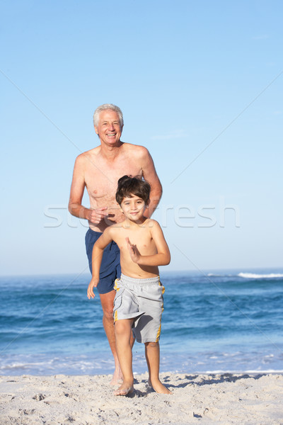 Nagyapa apa unoka fut tengerpart család Stock fotó © monkey_business