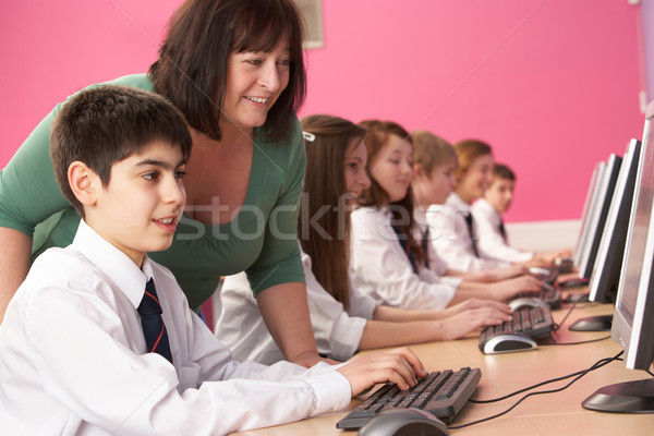 Teenage Students In IT Class Using Computers In Classroom With T Stock photo © monkey_business