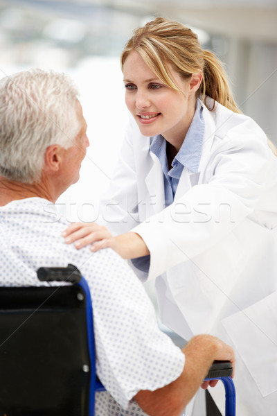 Senior patient with young doctor Stock photo © monkey_business