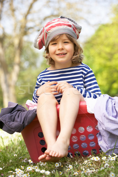 Young Boy Sitting In Laundry Basket Stock photo © monkey_business