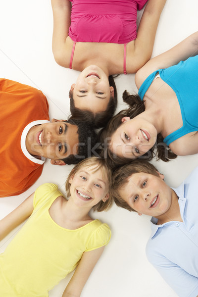 Overhead View Of Five Young Children In Studio Stock photo © monkey_business