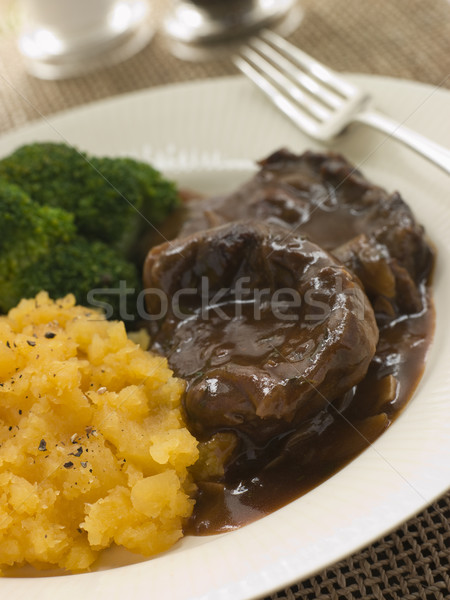 Stock photo: Shin of Beef Braised in Stout with Mashed Swede and Broccoli