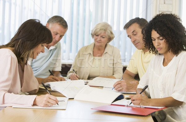 Adult students studying together Stock photo © monkey_business