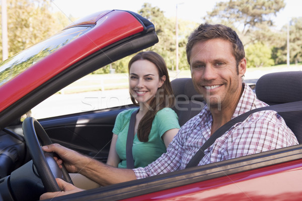 Couple in convertible car smiling Stock photo © monkey_business