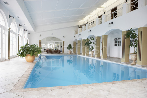 Piscina estância termal hotel férias estilo de vida luxo Foto stock © monkey_business