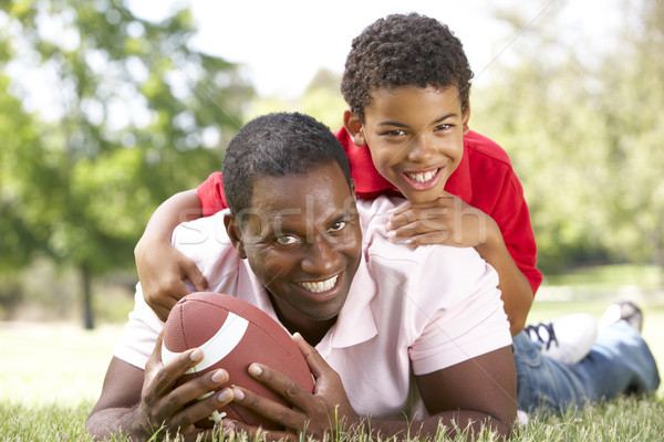 Stock photo: Father And Son In Park With American Football
