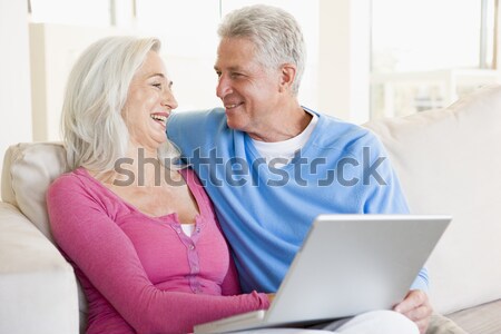 Adult Son And Senior Mother Using Laptop At Home Stock photo © monkey_business