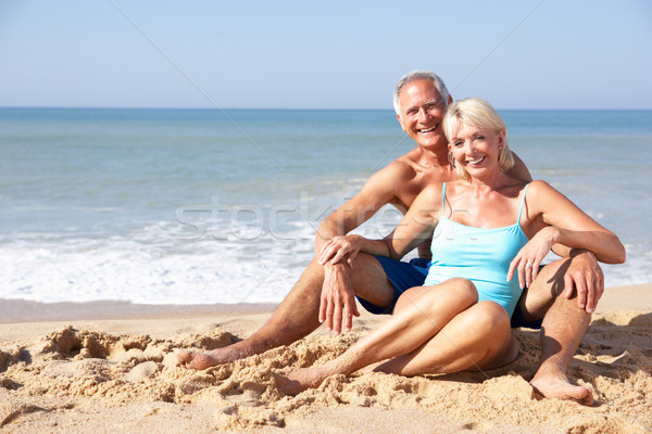 Senior couple on beach holiday Stock photo © monkey_business