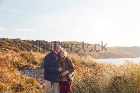Couple Hiking Across Moorland Covered With Heather Stock photo © monkey_business