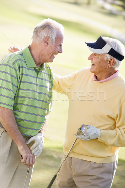 Stock photo: Male Friends Enjoying A Game Of Golf