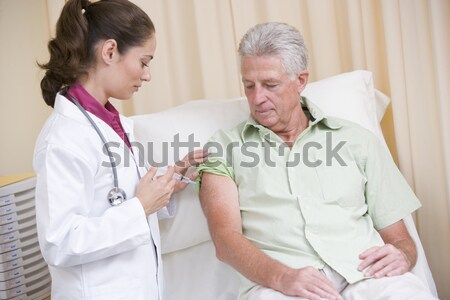 Doctor Talking With Senior Man Stock photo © monkey_business
