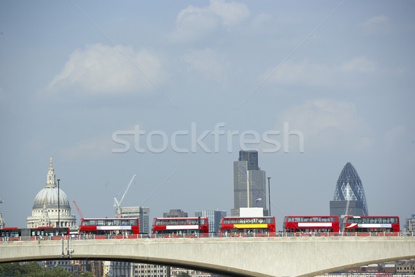 Double Decker Buses Lined Up On A Bridge With St Paul's Cathedra Stock photo © monkey_business