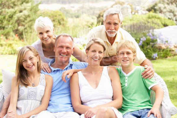 Extended Family Relaxing In Garden Stock photo © monkey_business